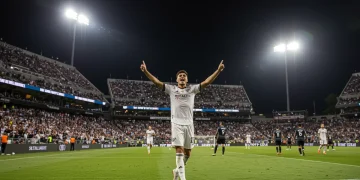 MLS Matchday 1: Top 5 Game-Winning Goals Analyzed Player celebrating a decisive game-winning goal in a packed MLS stadium under bright lights.